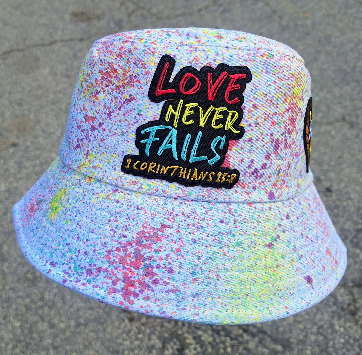 "Love Never Fails" Bucket Hat